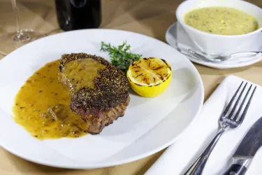Masō Au Poivre - Pepper Crusted NY Strip with Brandy Cream Sauce Photo