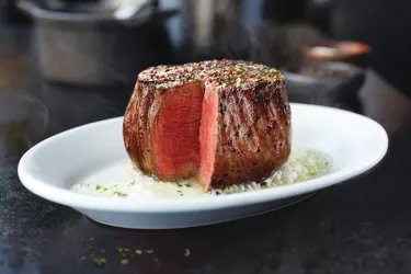 Filet, 11 oz - Our most tender cut of meat. Photo