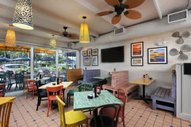 Cha Cha Coconuts - Dining Room - Join us at Cha Cha Coconuts and lose yourself in our carefree island atmosphere. Casual dining with a tropical twist, offering a savory selection of seafood, sandwi... Photo