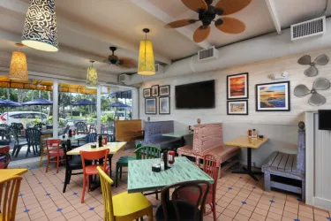 Cha Cha Coconuts - Dining Room - Join us at Cha Cha Coconuts and lose yourself in our carefree island atmosphere. Casual dining with a tropical twist, offering a savory selection of seafood, sandwi... Photo