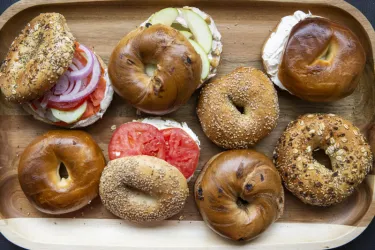 Bagel Brunch - real deal NY bagels -- par baked, flash frozen, shipped from new york and finished that morning in our oven -- and bagel sandwiches, wrapped in white butcher paper, just like you get... Photo