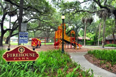 Firehouse Park - This park has a fun “Firefighter” inspired design. Come “rescue” the day! Playground, swing-set, picnic tables & grill and allows leashed pets. Photo