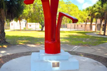 Encore Sculpture - Home for the Encore sculpture created by Saul Howard in 1975. The Red-painted concrete sculpture stands over 10 ft. tall! Photo