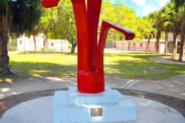 Encore Sculpture - Home for the Encore sculpture created by Saul Howard in 1975. The Red-painted concrete sculpture stands over 10 ft. tall! Photo